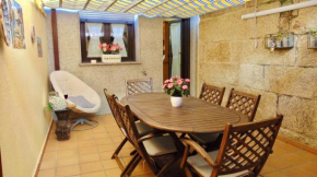 Casa centro o grove con terraza y asador